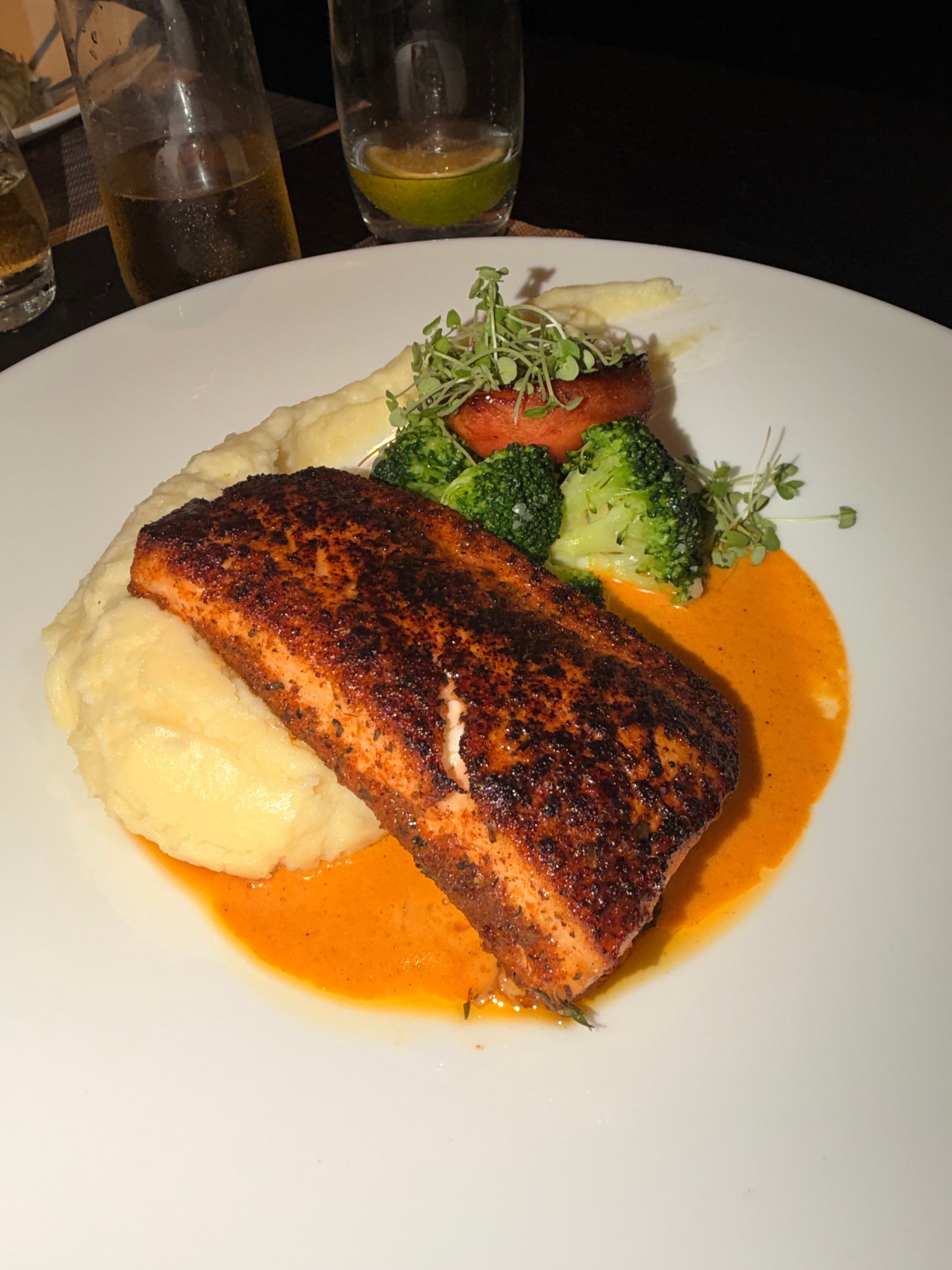 Salmon with mashed potatoes, vegetables and peri-peri sauce at ROK Hotel Kingston